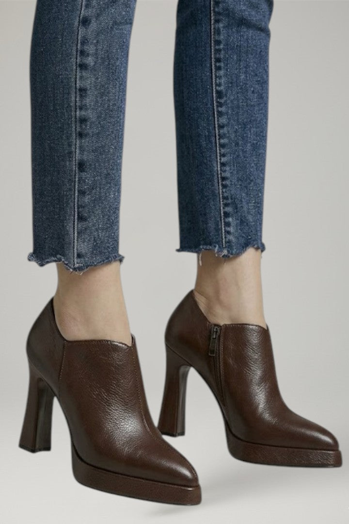 Step out in style with these women's elevated platform pumps, modern block heel & side zipper.
