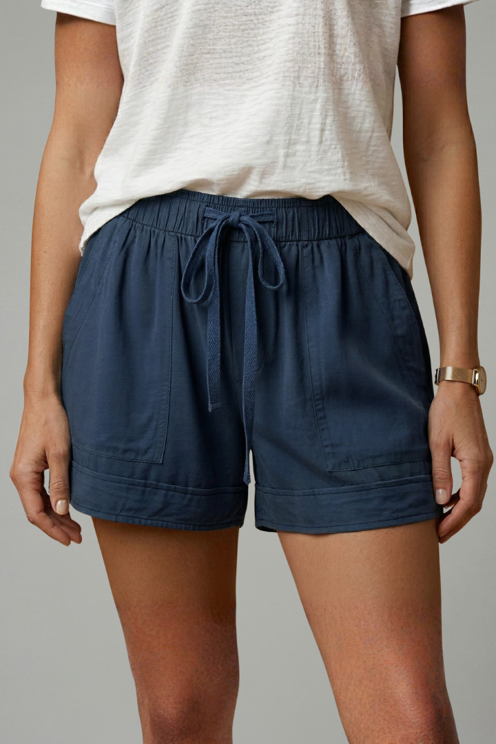 Relaxed fit women's shorts, pull-on style with drawstring, essential summer wear.