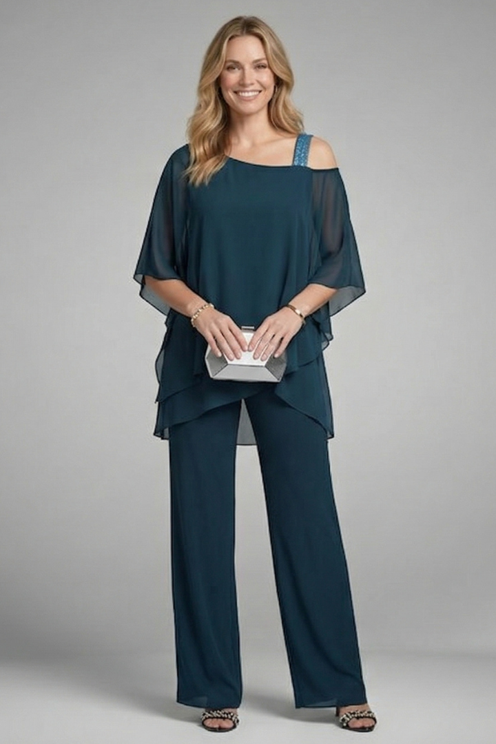 Relaxed fit women's two-piece set: asymmetrical top and comfortable wide-leg pants, ideal for loungewear.