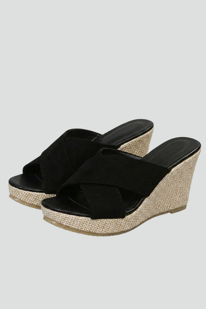 Women's beige wedge sandals with comfortable strappy design, perfect for summer casual wear.