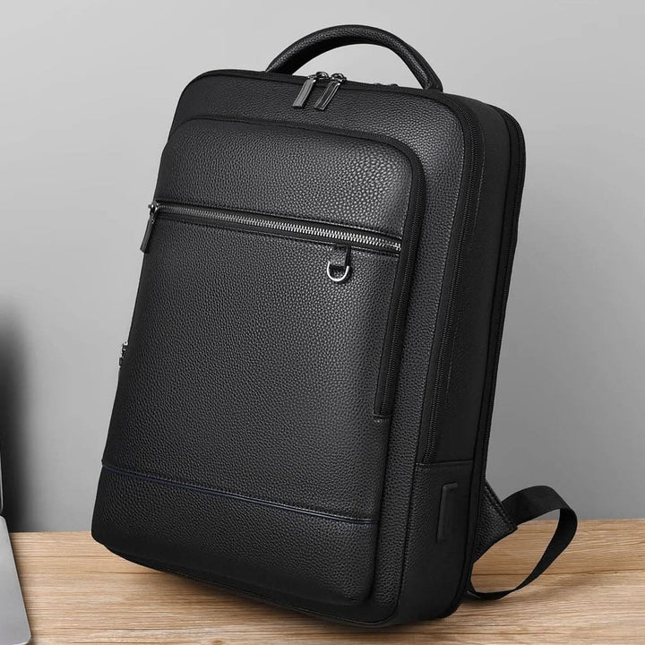 Stylish black PU leather laptop bag with USB charging for tech-savvy travelers, ergonomic fit.