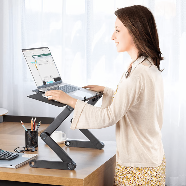 Adjustable ergonomic laptop stand with mouse pad, metal finish, versatile, and portable design for comfortable workspace.