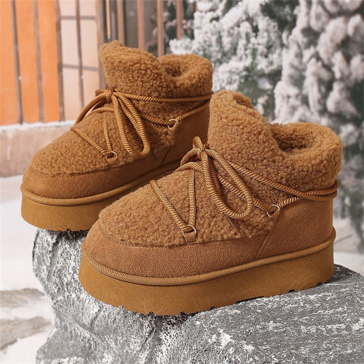Lace-up Aurelia women's comfort boots, perfect for winter. Features a warm fleece lining and durable sole.