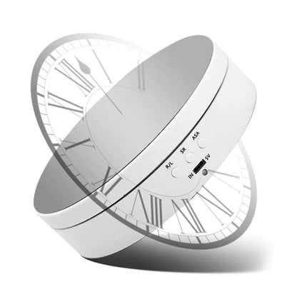"Black electric motorized rotating display stand, round base, showcasing 360° rotation for professional photography setups."