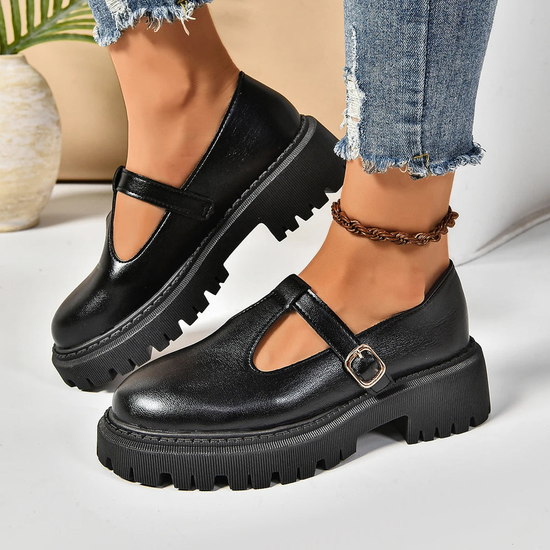 Black T-strap platform orthopedic Mary Jane shoes for women, classic retro style.