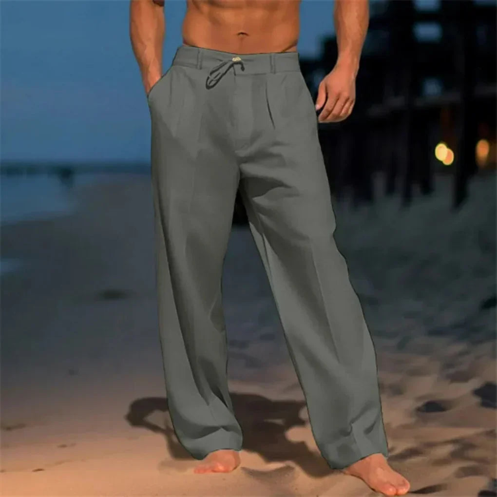 Men's relaxed fit drawstring dress pants in dark blue. Straight leg, comfortable, versatile for smart casual summer style.