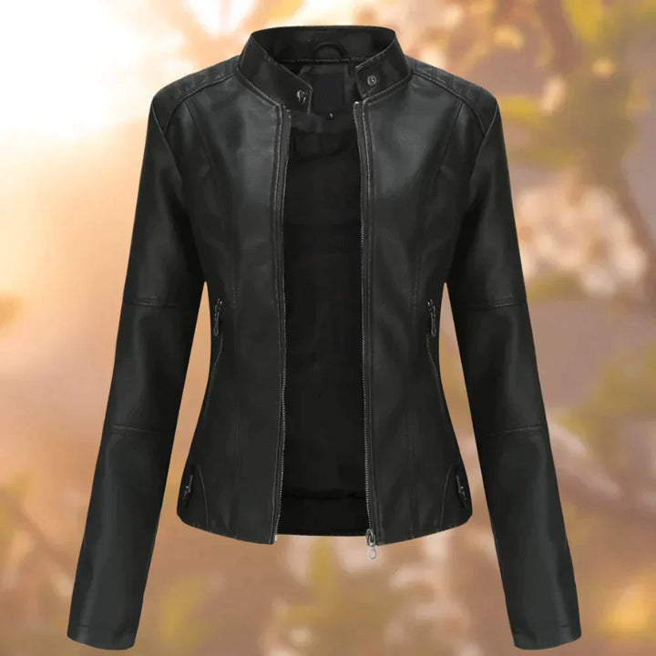 Women's sleek black biker jacket, perfect for effortless style & transitional weather. Fitted, stylish outerwear.