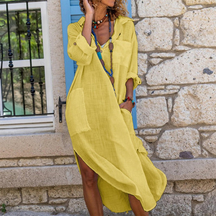 Stylish breezy women's shirt dress. This oversized button-down midi is perfect for summer & travel.