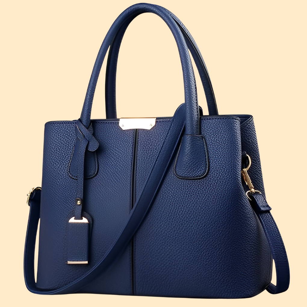 Close-up of stylish women's structured satchel, showcasing design details, elegant lines, and secure closure.