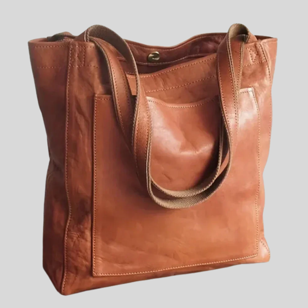 Elegant women's tote bag with adjustable shoulder strap, perfect for everyday or cross-body wear.