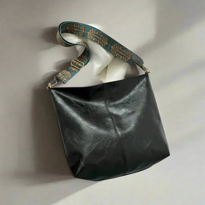 Women's vintage shoulder bag, elegant retro fashion accessory for everyday chic style.