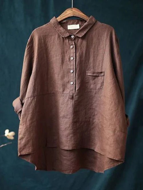 Effortless oversized button-down women's shirt with a relaxed fit. A versatile long sleeve blouse for chic fashion.