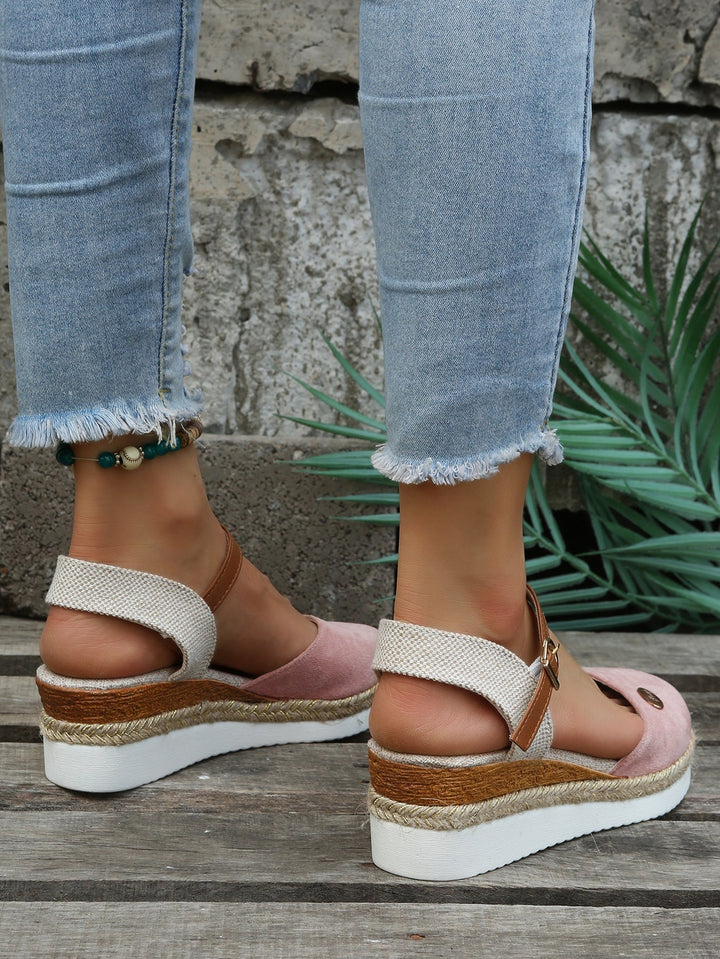 Stylish women's platform espadrille sandals featuring a woven design & closed toe. Perfect for summer fashion.