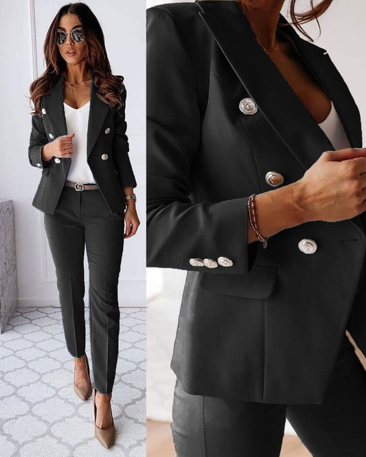 "Chic women's double-breasted suit set with tailored trousers, featuring notched lapels and metallic buttons for a sleek look
