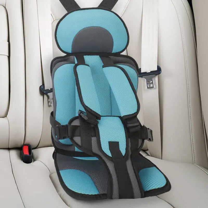 "Child safety car cushion seat in bright red with comfy padding and adjustable straps for secure, cozy travel."