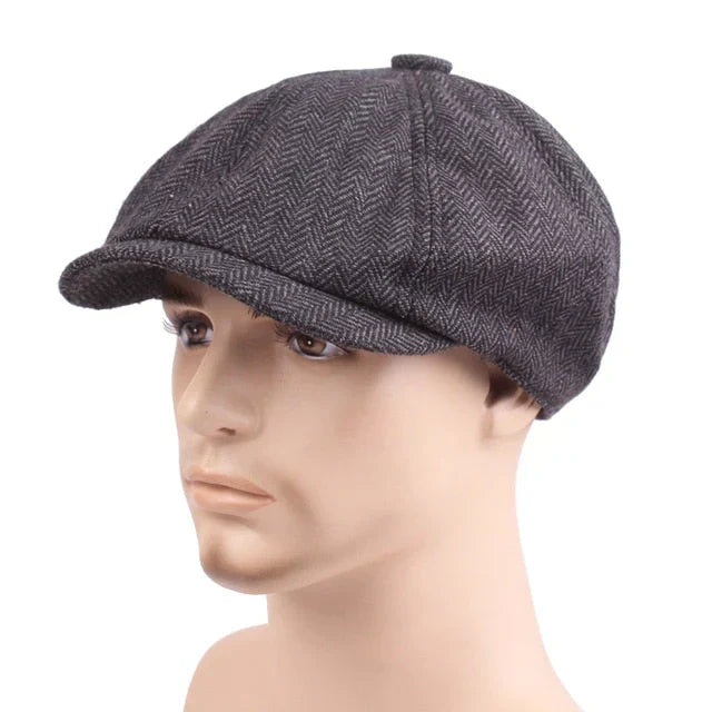 Stylish men's flat cap in classic vintage style, perfect headwear for a sophisticated gentleman.