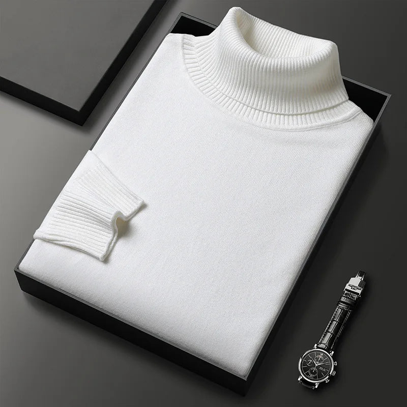 Man models a stylish, warm men's classic turtleneck pullover sweater, essential for versatile winter fashion.