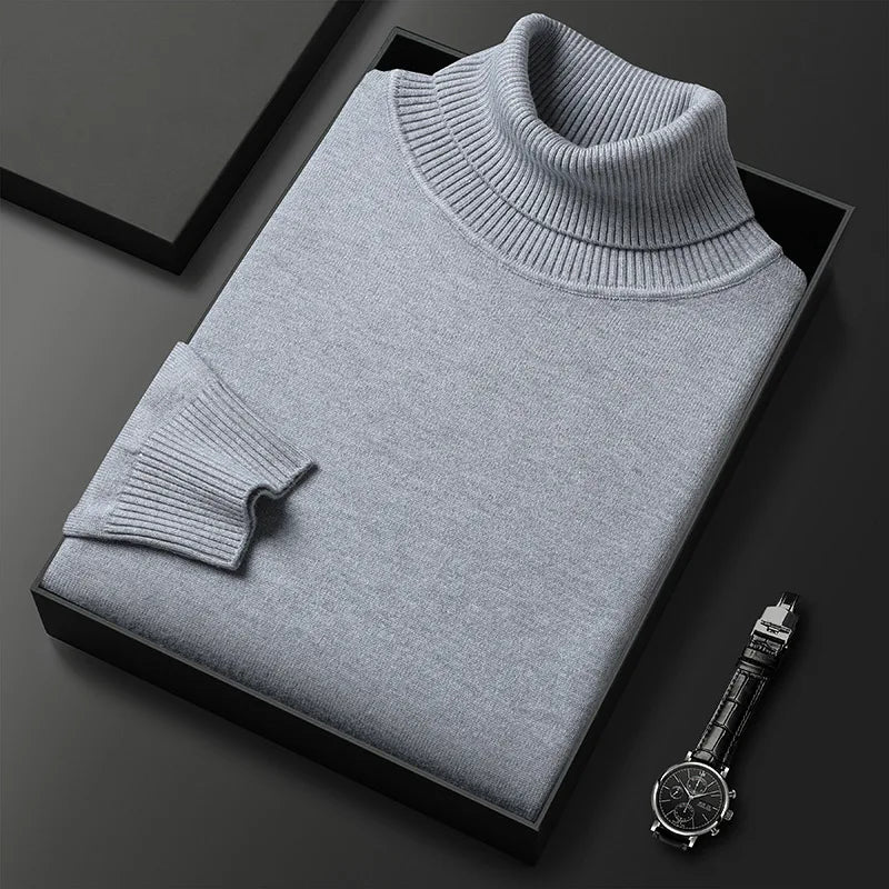 Deep navy men's classic turtleneck pullover sweater. A timeless, warm piece for winter casual wear & men's clothing.
