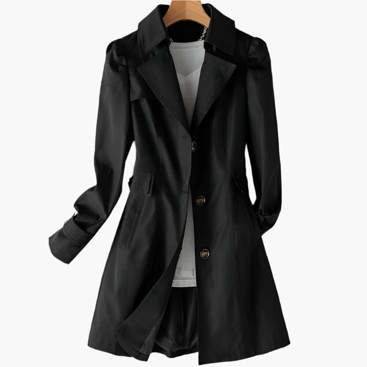 Beige women's classic trench coat with a tailored fit, perfect for professional or smart casual wear. Timeless.