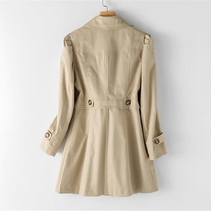 Timeless women's tailored trench coat, an essential transitional jacket that exudes classic elegance and style.