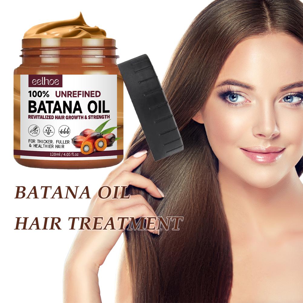 Clear bottle of 100% pure Batana oil for hair and skin care, shown against a plain background, highlighting its rich texture.