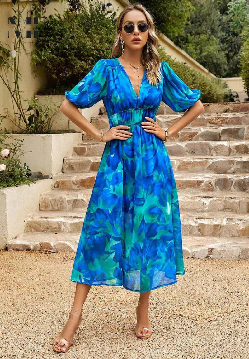 Women's summer fashion: a short sleeve V-Neck Midi Dress with a charming floral print & tie-waist.