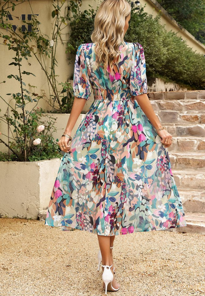 Full shot of model wearing a stylish Women's Floral Print V-Neck Midi Dress, perfect for summer.