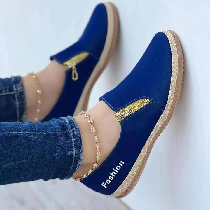 Sporty chic Lina women's slip-on sneakers. Versatile casual footwear perfect for spring & summer style.