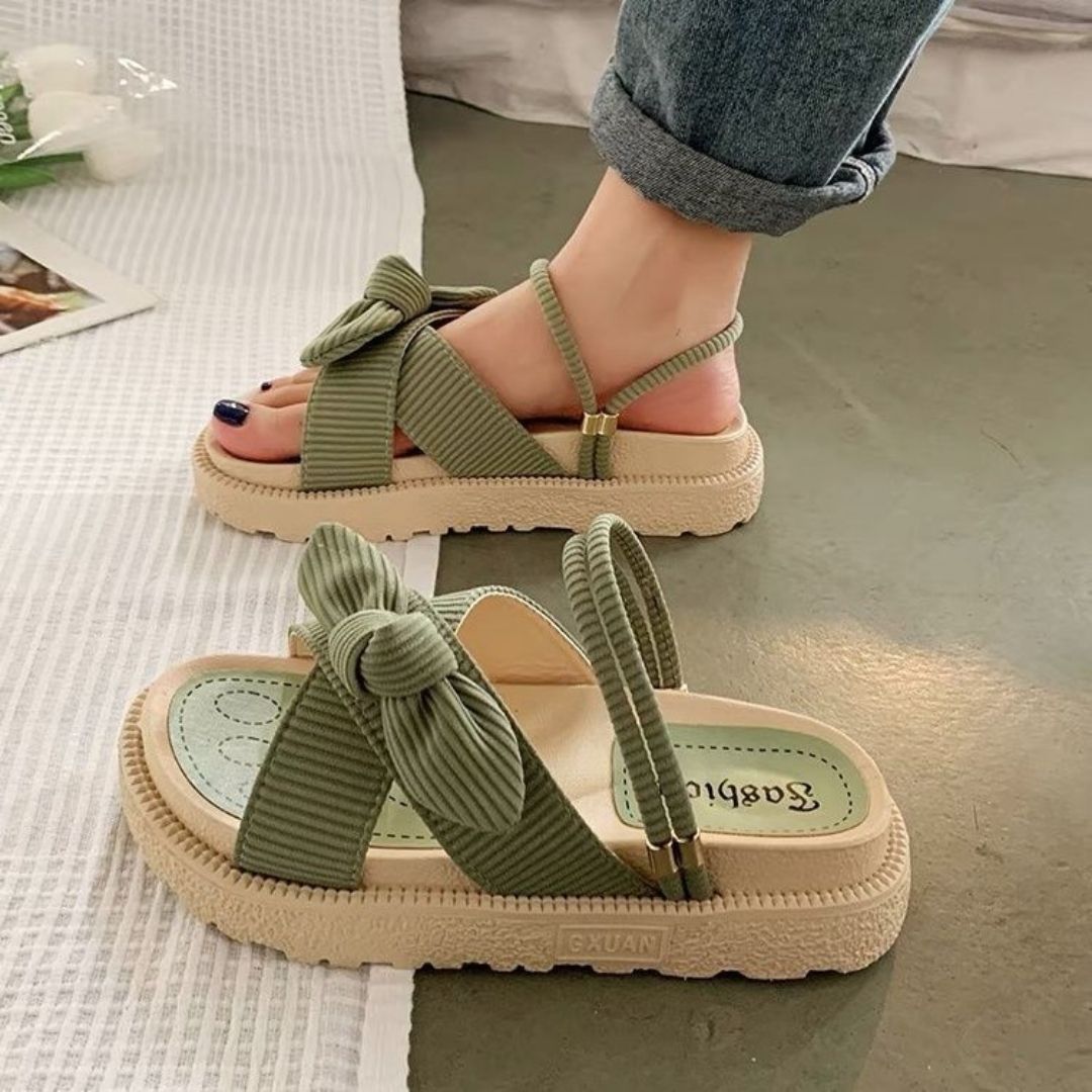 Women's comfortable summer sandals with cushioned sole, ideal for casual wear & vacation.