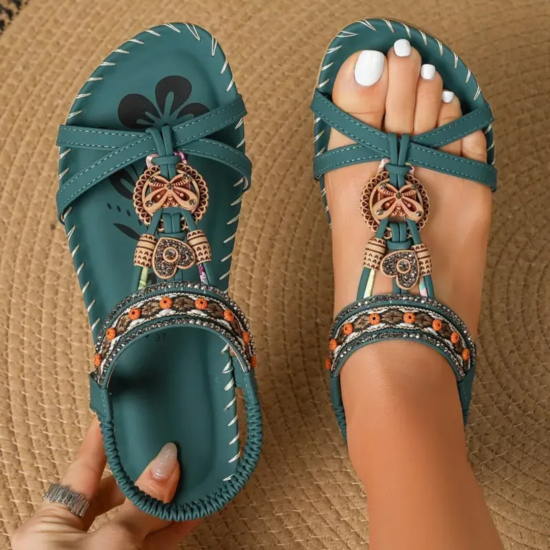 Comfortable women's flat T-strap sandals, perfect for daily wear & casual summer outfits.