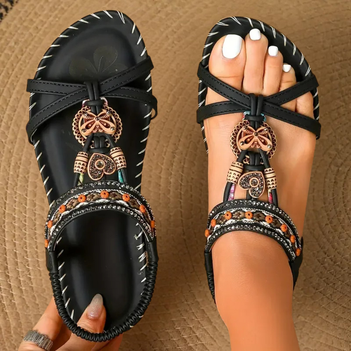 Women's daily wear flat sandals featuring a comfortable elastic T-strap, great for summer casual footwear.
