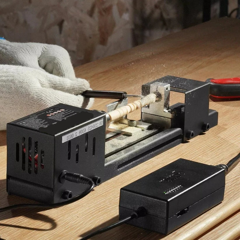 Compact Mini Wood Lathe Machine for DIY Projects, with sturdy build and precision, ideal for woodworking enthusiasts.