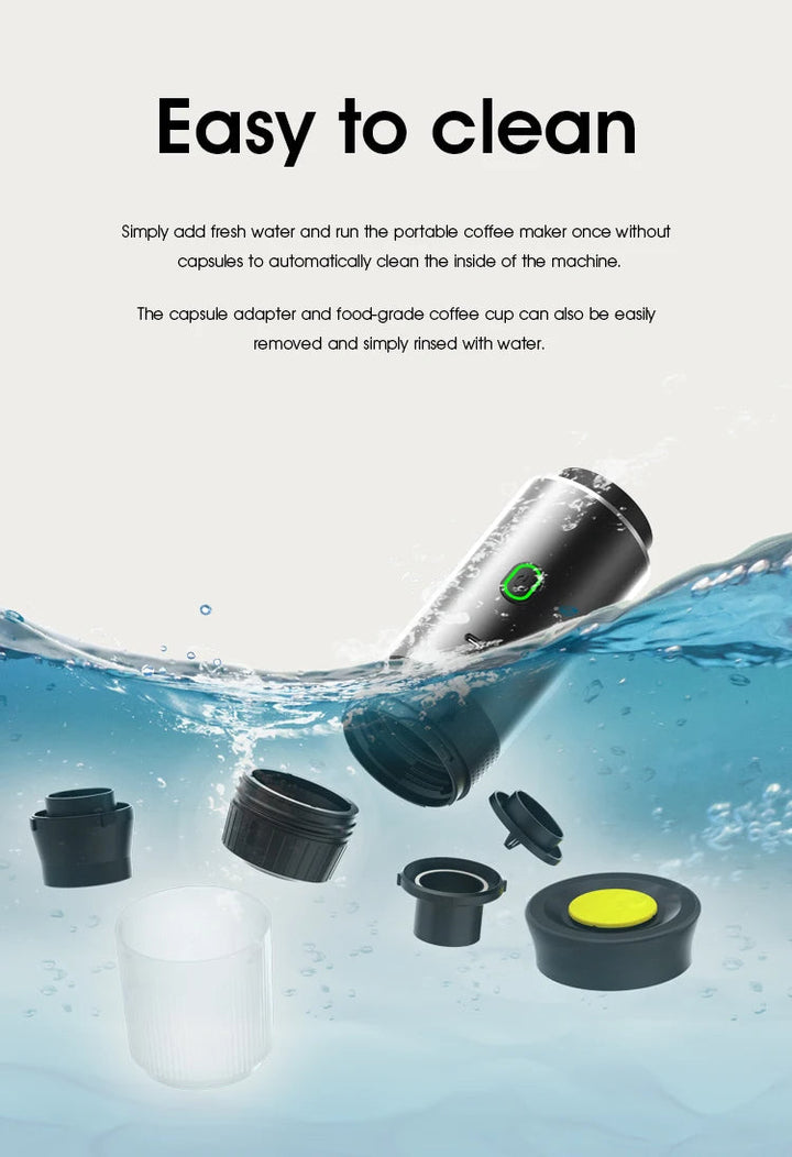 "Compact portable espresso maker, USB charged, black sleek design, suitable for ground coffee and capsules."