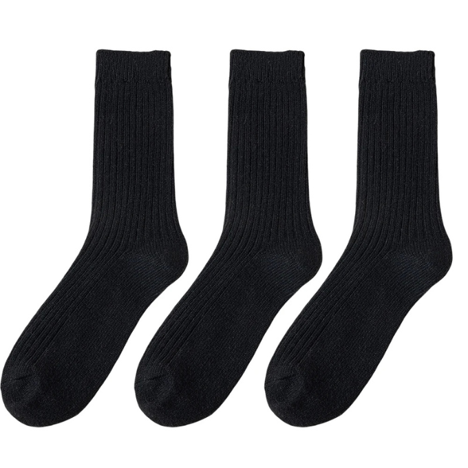 Thick wool winter socks with a rustic knit pattern, providing maximum warmth and coziness.