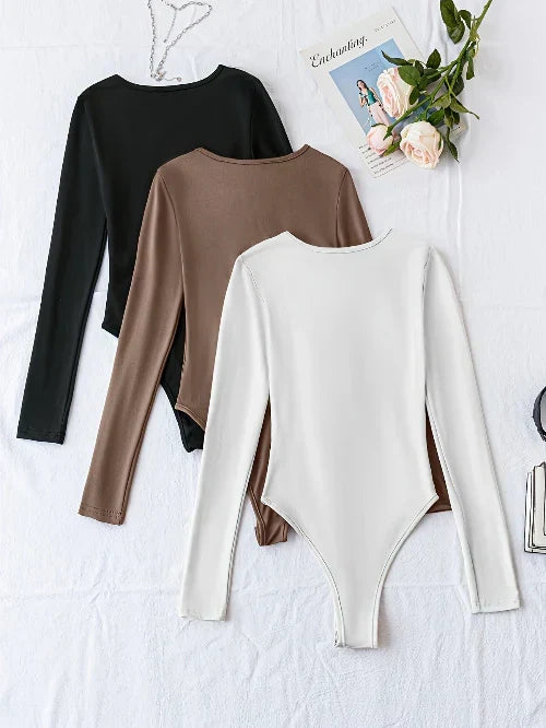 Comfortable women's 3-pack long sleeve crew neck bodysuits, a versatile addition to your wardrobe.