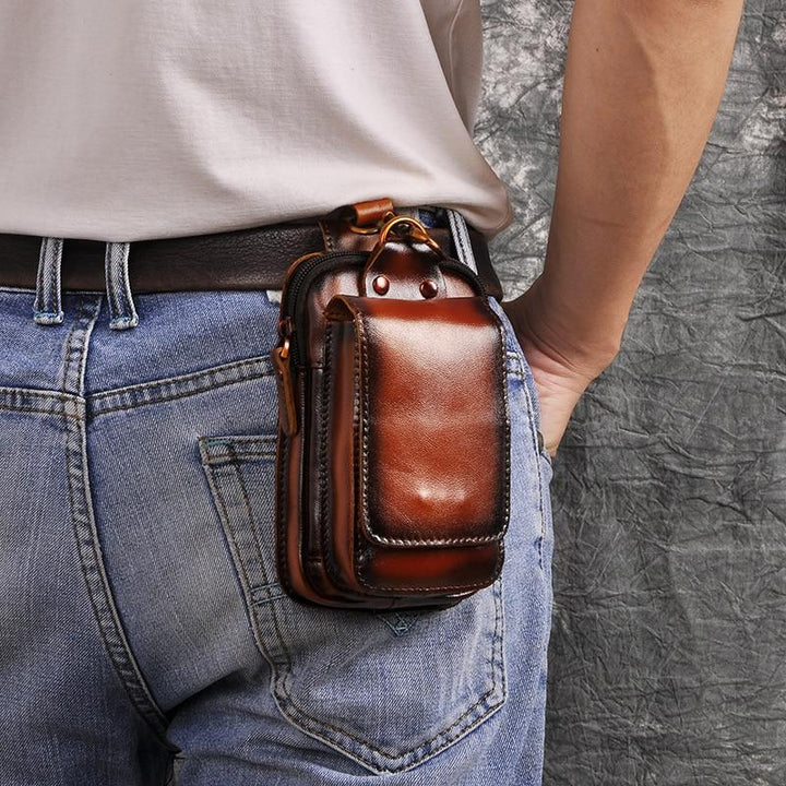 Stylish men's dark brown fanny pack, ideal for everyday carry & travel, durable and practical.