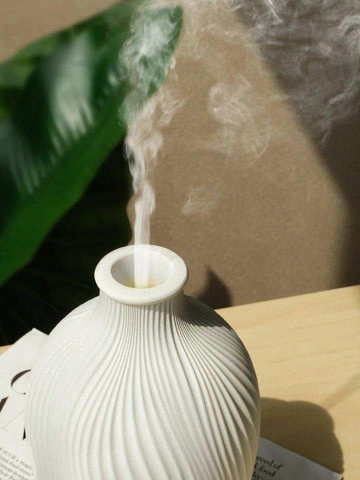 Tavvitaimp18 essential oil diffuser & humidifier, perfect for aromatherapy, relaxation & home decor.