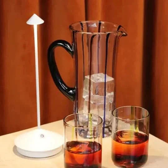 Modern dimmable LED accent spotlight, wireless & portable, ideal for indoor home decor lighting.