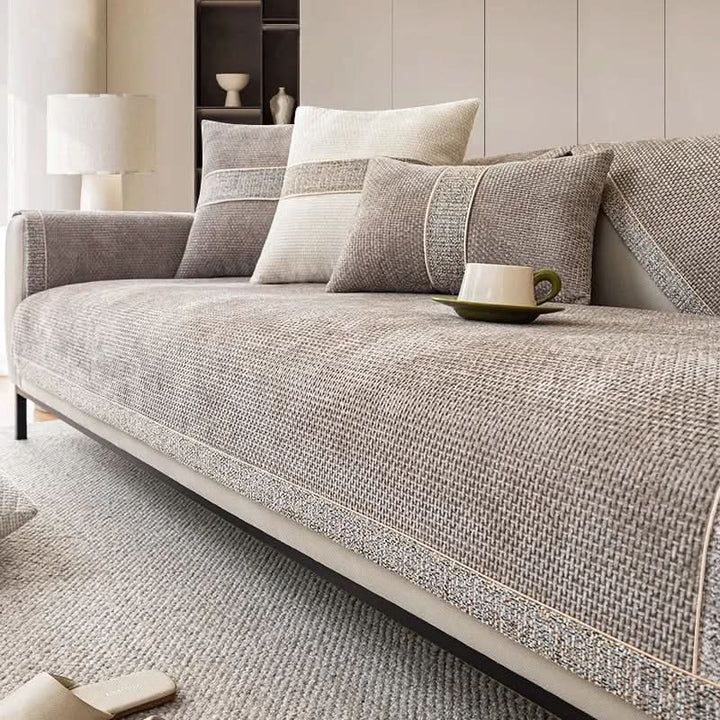 Stylish linen texture sofa cover in a neutral tone, designed to be non-slip for ultimate couch protection.