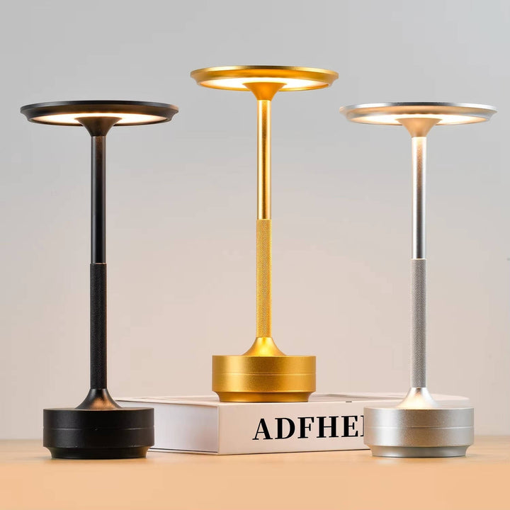 Versatile LED lamp: rechargeable, touch-controlled, 3-color dimmable light. Great for reading or ambiance.