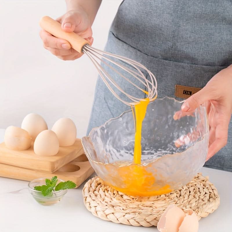 Durable 12-piece heat resistant silicone kitchen tool set with wooden handles. Dishwasher safe.