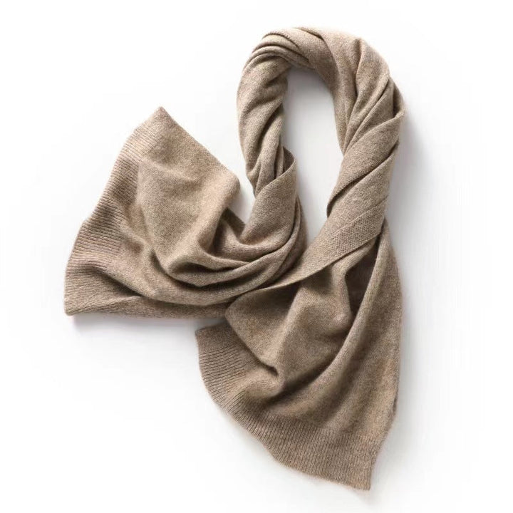 Versatile tan knit shawl wrap worn as a scarf, perfect for women's fashion.