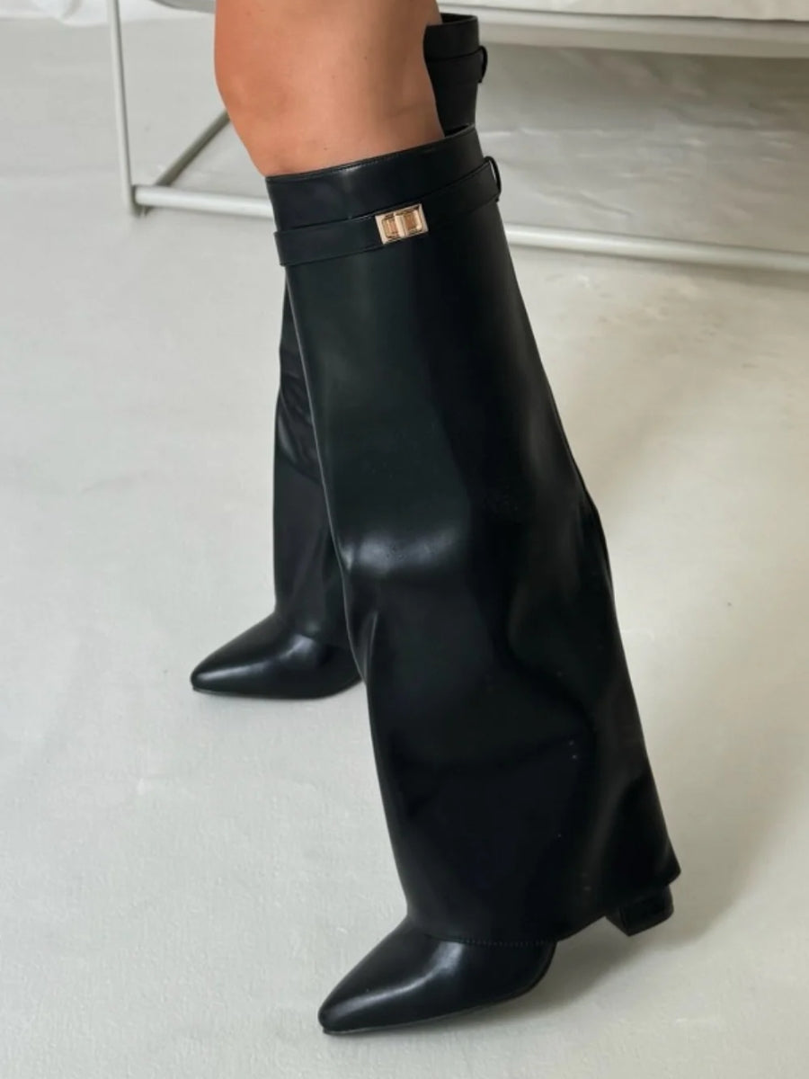 Side profile of women's elegant leather thigh-high boots, highlighting the chic buckle feature.