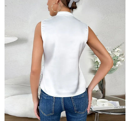 Elegant black sleeveless women's top, flattering fit, highlighting shoulders, ideal for casual or formal occasions.