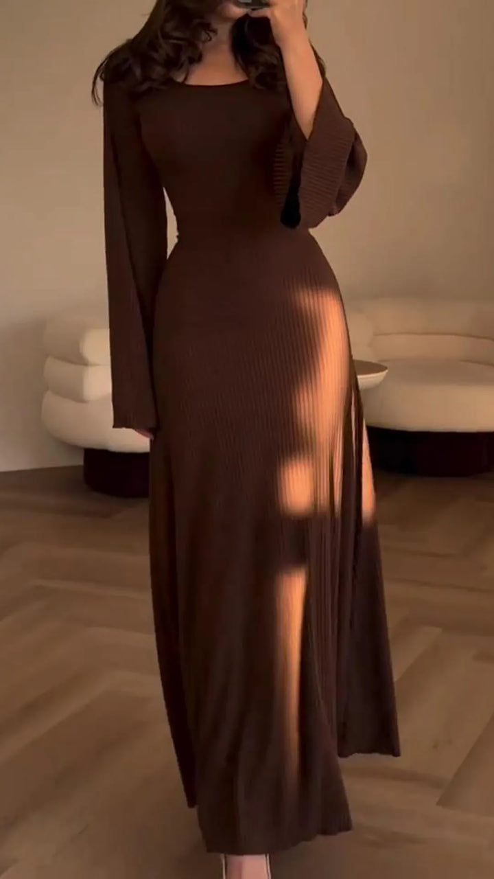 Feminine bodycon maxi dress, elegant & form-fitting with beautiful corset lacing, ideal for special events.