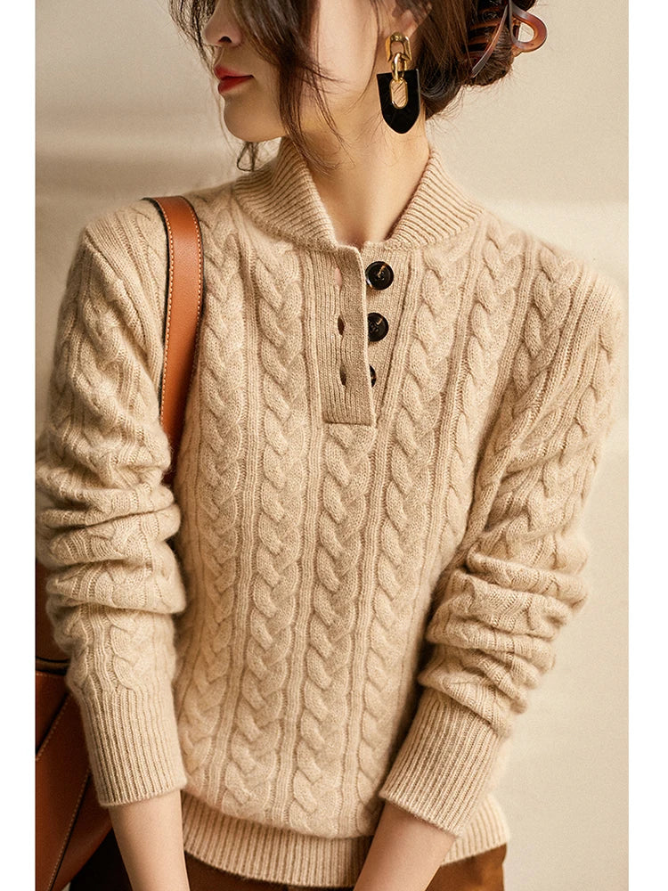 An elegant women's top: a cable knit cashmere blend sweater with a comfortable, classic fit