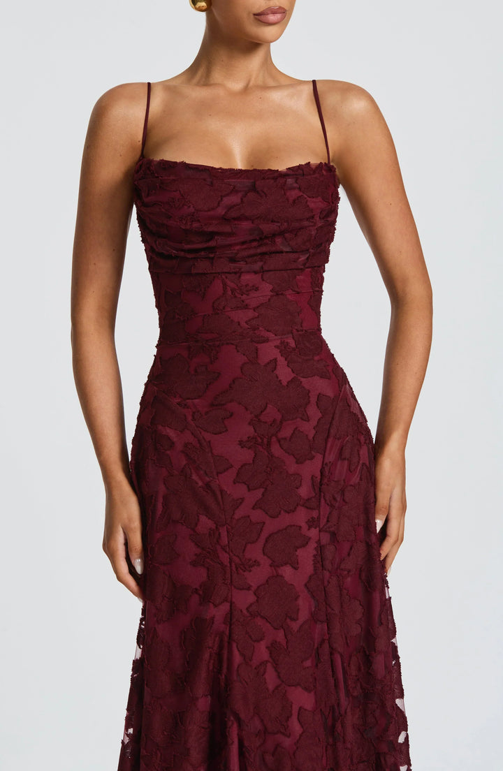Women's A-line floral maxi gown with spaghetti straps, elegant for weddings, proms, and special occasions.