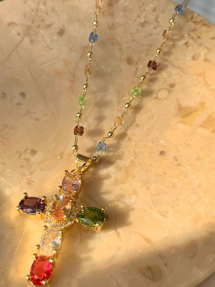 Fashionable gold plated cross pendant, a statement piece of gemstone jewelry for elegant women