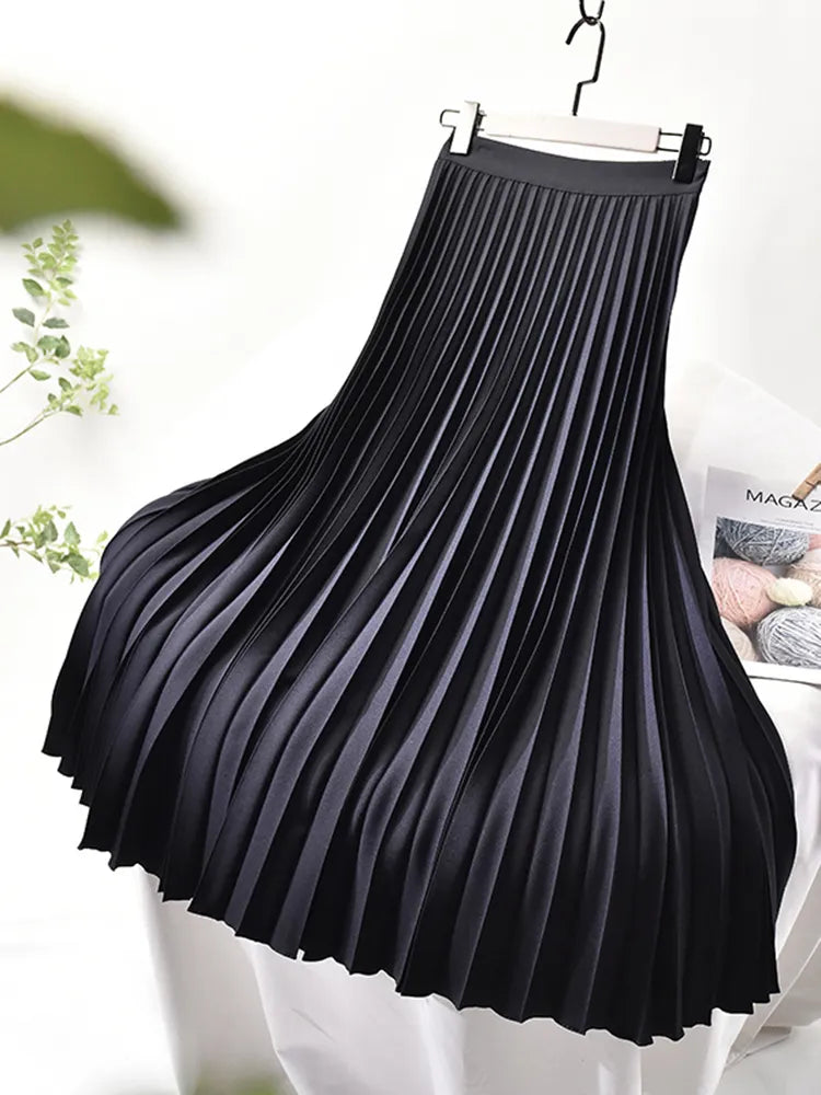 Elegant high-waist pleated midi skirt for women. Versatile classic style, perfect for office, party & everyday fashion.