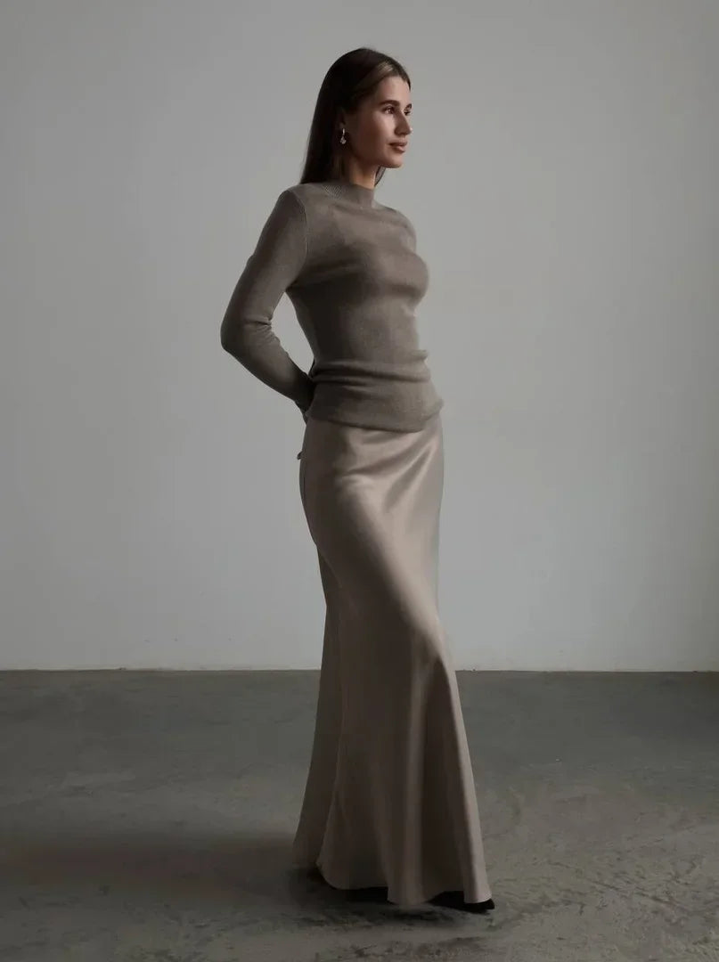 Chic women's high-waisted fishtail maxi skirt, ideal for formal evening parties.
